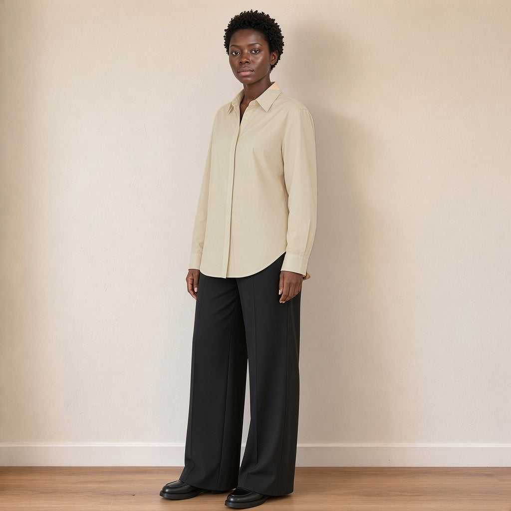 Chemise ample à patte de boutonnage cachée, abricot nacré, vue de trois quarts – SAKIWÉ
