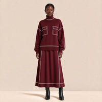 Ensemble en maille pull oversize col roulé à passepoils contrastés et jupe trapèze midi