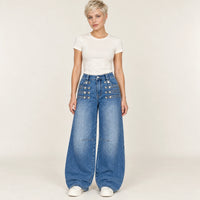 Jean large bleu vintage à boutons métalliques sur les hanches, vue de face