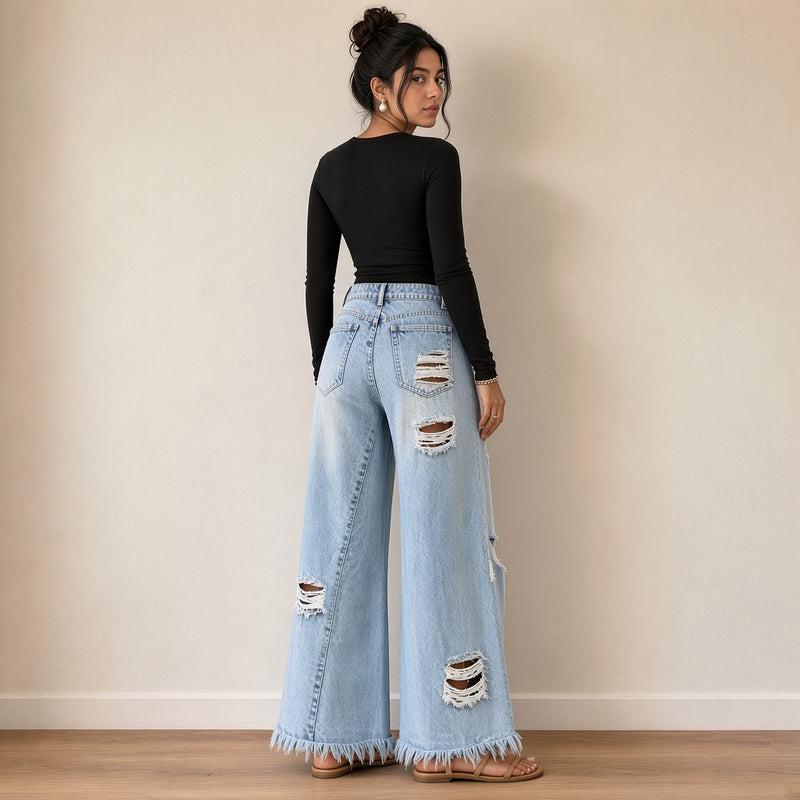 Jean large bleu clair déchiré, vue de dos – SAKIWÉ