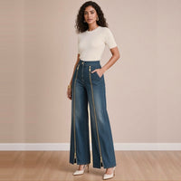 Jean large indigo à zips dorés, vue de trois-quarts – SAKIWÉ