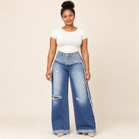 Jean large bleu à taille rabattue et déchirures, vue de face