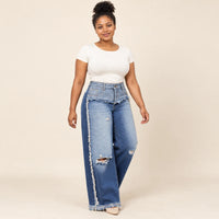 Jean large bleu déchiré à taille rabattue, vue trois quarts