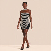 Mini robe bandage noire à cristaux SAKIWE en mouvement