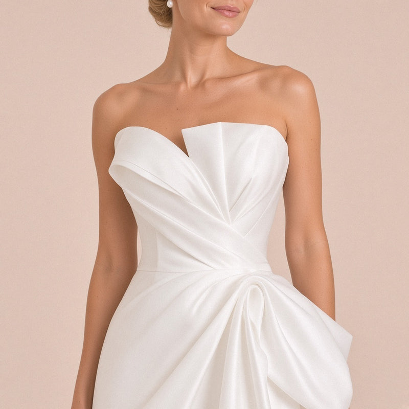 Robe de mariée portée, détail du bustier à plis repliés et encoche en V