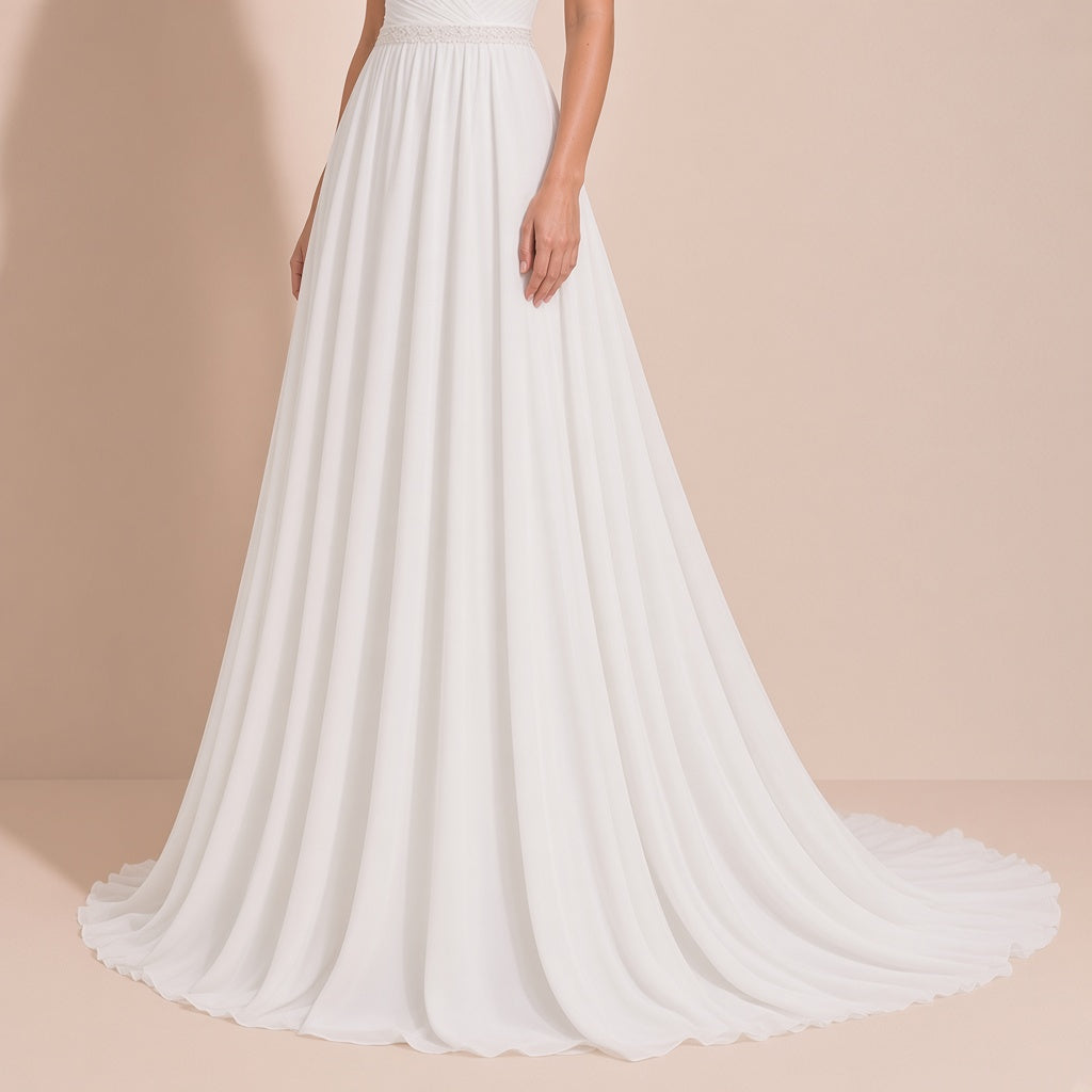 Robe de mariée portée, détail de la jupe en voile fluide et de la traîne