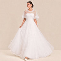 Robe de mariée princesse portée en marchant, jupe en tulle en mouvement