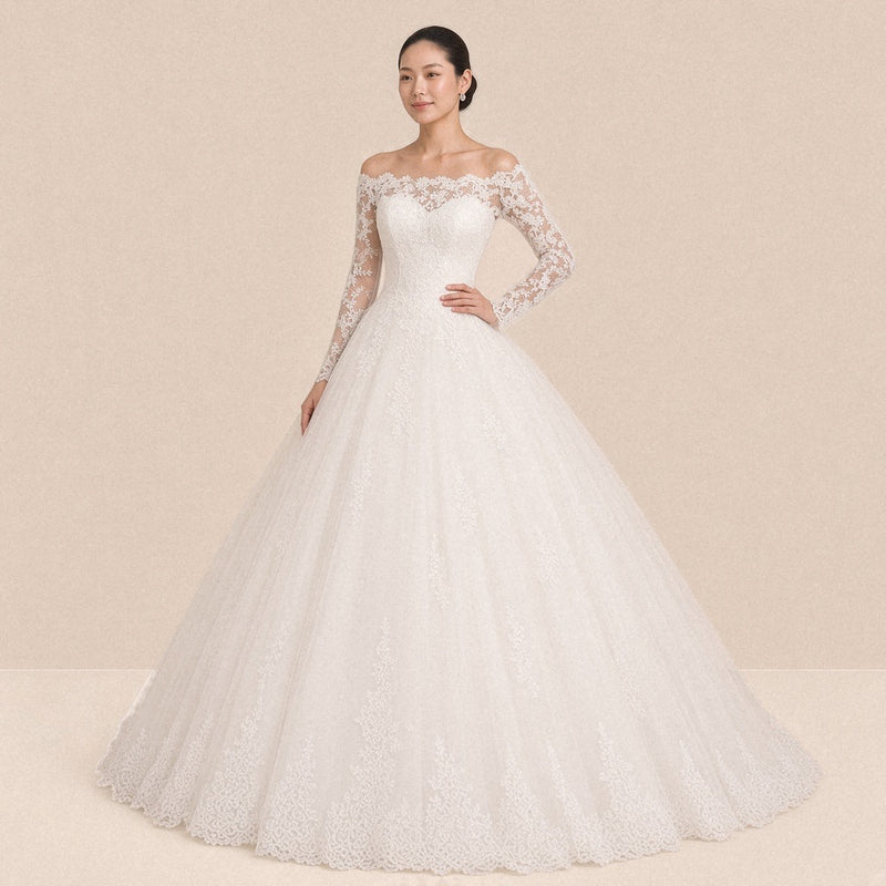 Robe de mariée princesse épaules dénudées et manches longues en dentelle, vue de face