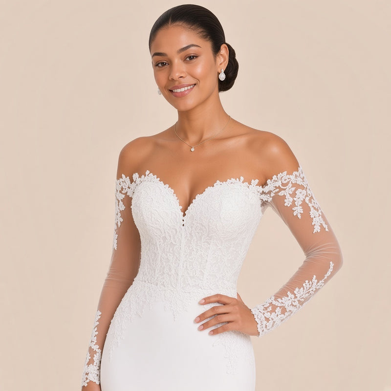 Détail du décolleté en cœur, du buste en dentelle et des manches en tulle