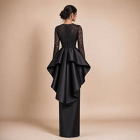 Robe de soirée longue à basque volantée, buste en dentelle brodée et manches longues, vue de dos, coloris noir – SAKIWE