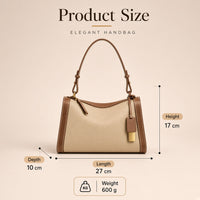 Sac porté épaule oreiller en cuir grainé à pampille dorée — dimensions 27 × 10 × 17 cm