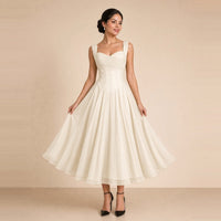 Robe midi corsetée à décolleté cœur, buste nervuré et jupe en voile évasée